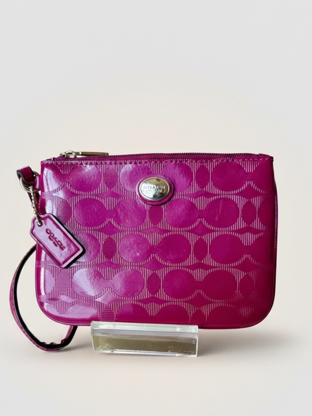 Coach F52282 Embossed Signature C Patent Leather Small Wristlet in Raspberry.